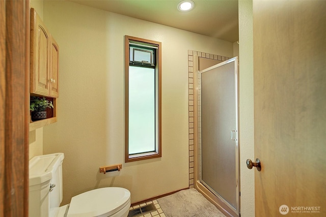 9430 Hoeder Ln, Bothell, WA 98011 - full bathroom with toilet, a shower stall, and recessed lighting