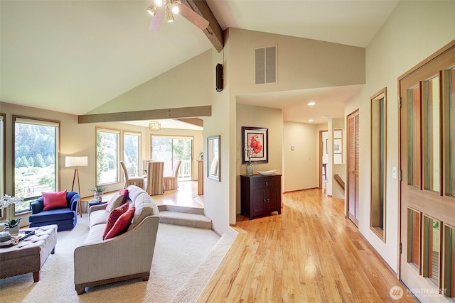 9430 Hoeder Ln, Bothell, WA 98011 - living room with high vaulted ceiling, beamed ceiling, light wood-type flooring, plenty of natural light, and a ceiling fan