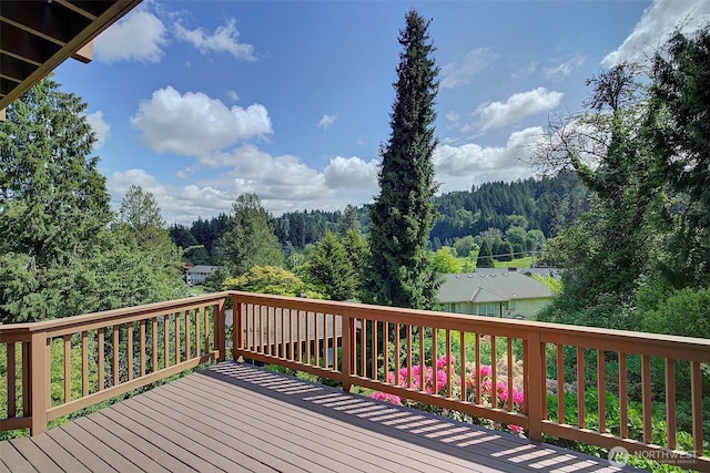 9430 Hoeder Ln, Bothell, WA 98011 - wooden deck featuring a view of trees