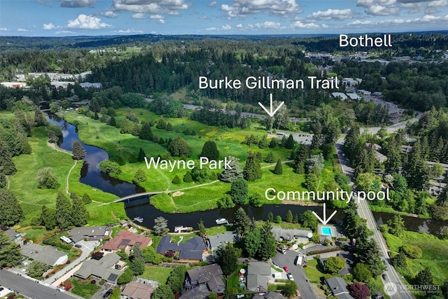 9430 Hoeder Ln, Bothell, WA 98011 - drone / aerial view of a nearby body of water and a forest