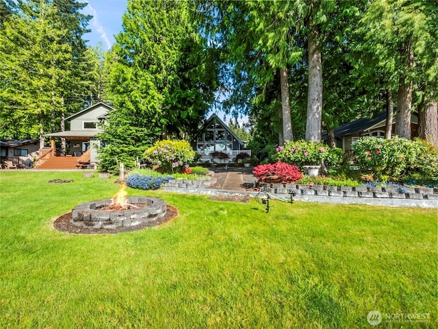 271 E Ballantrae Dr, Shelton, WA 98584 - view of grassy yard with a fire pit