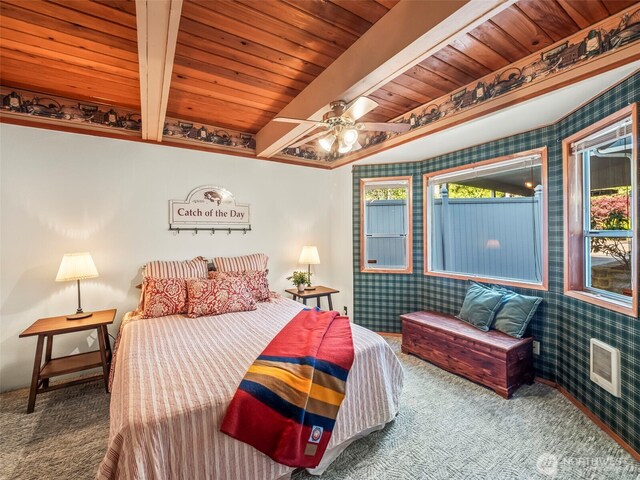 271 E Ballantrae Dr, Shelton, WA 98584 - carpeted bedroom with wallpapered walls, wooden ceiling with exposed beams, and ceiling fan