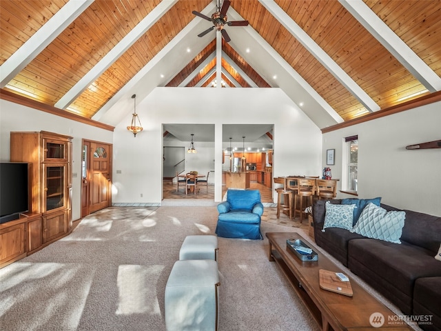 271 E Ballantrae Dr, Shelton, WA 98584 - carpeted living room with high vaulted ceiling, ceiling fan, wood ceiling with exposed beams, recessed lighting, and baseboards