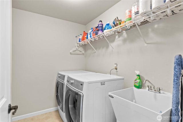 509 L NE, Quincy, WA 98848 - laundry area with washing machine and dryer and baseboards