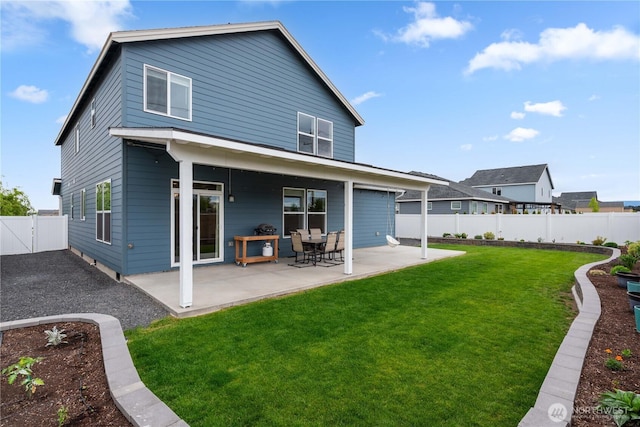 509 L NE, Quincy, WA 98848 - rear view of house featuring a patio area and a gate