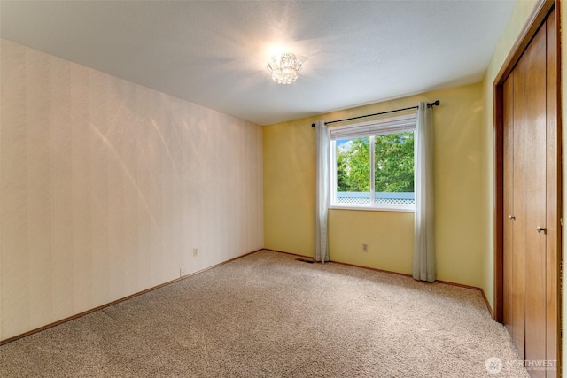 12903 SE 282nd Way, Kent, WA 98030 - unfurnished bedroom with light colored carpet, a closet, and baseboards