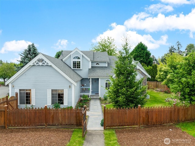 12903 SE 282nd Way, Kent, WA 98030 - view of front of home featuring roof with shingles and a fenced front yard