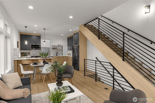 4426 Midvale Ave N, Seattle, WA 98103 - living area with light wood-type flooring and recessed lighting