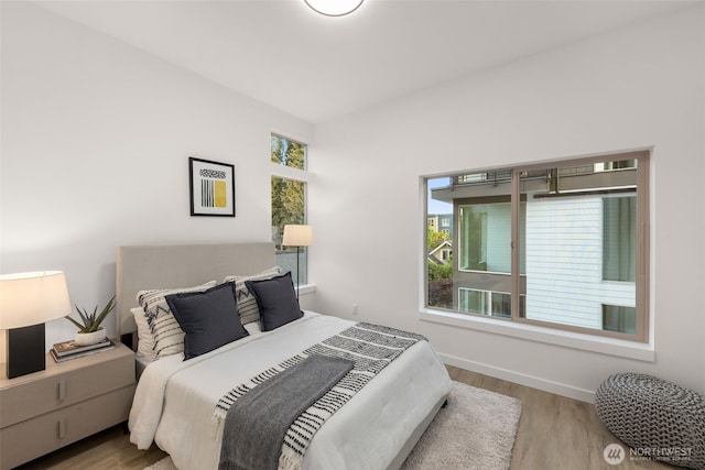 4426 Midvale Ave N, Seattle, WA 98103 - bedroom featuring wood finished floors and baseboards