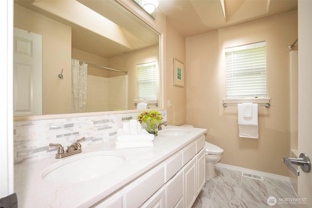 19 198th Pl SE, Bothell, WA 98012 - bathroom featuring toilet, a shower with curtain, double vanity, baseboards, and marble finish floors