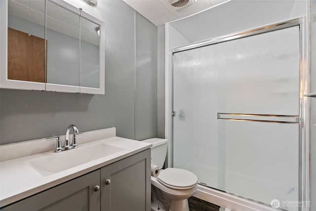 4224 N Brooks Rd, Medical Lake, WA 99022 - full bath featuring a stall shower, vanity, and toilet