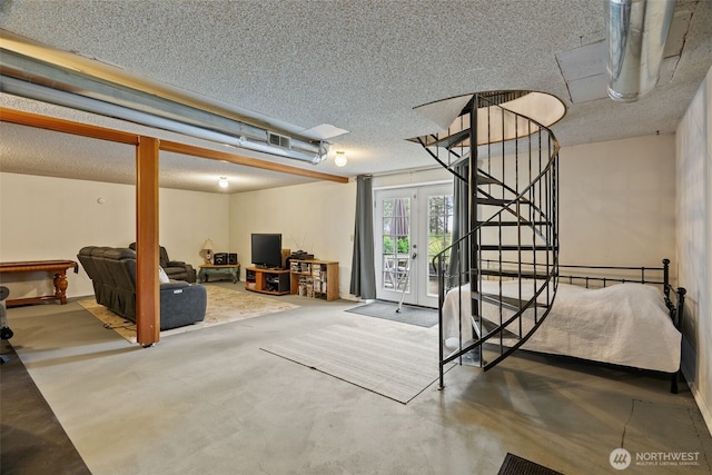 4224 N Brooks Rd, Medical Lake, WA 99022 - below grade area featuring a textured ceiling and stairs
