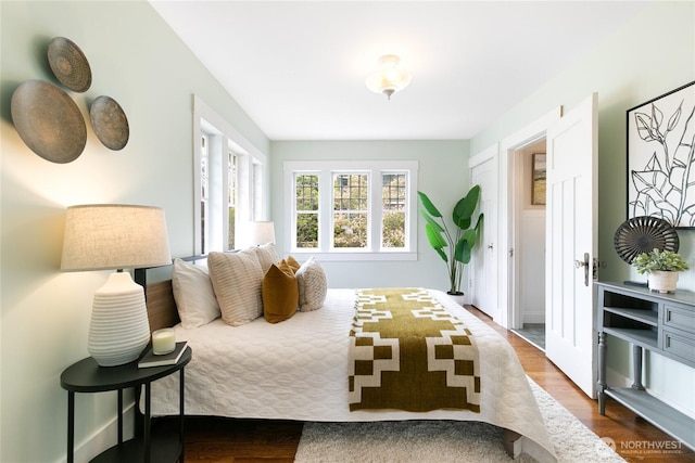 3929 SW Elmgrove St, Seattle, WA 98136 - bedroom featuring dark wood-style floors