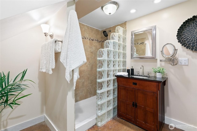 3929 SW Elmgrove St, Seattle, WA 98136 - bathroom featuring walk in shower, vanity, baseboards, and recessed lighting
