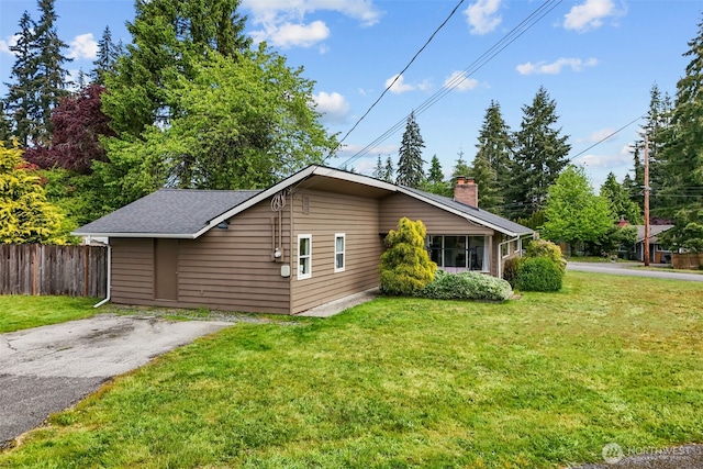 5003 219th St SW, Mountlake Terrace, WA 98043 - view of property exterior featuring a chimney