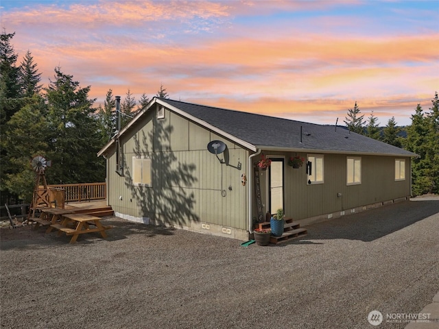 822 Filbert Rd, Cle Elum, WA 98922 - rear view of house with a wooden deck and roof with shingles
