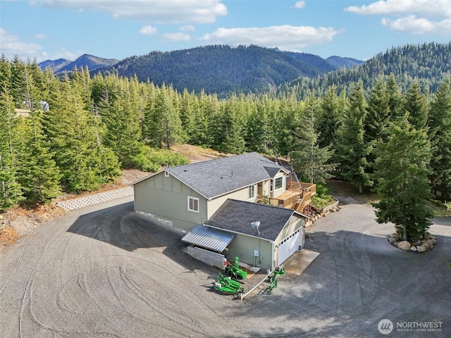 822 Filbert Rd, Cle Elum, WA 98922 - view of subject property featuring a heavily wooded area and mountains