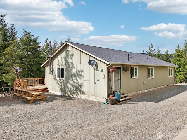 822 Filbert Rd, Cle Elum, WA 98922 - rear view of property with a deck, a shingled roof, and crawl space