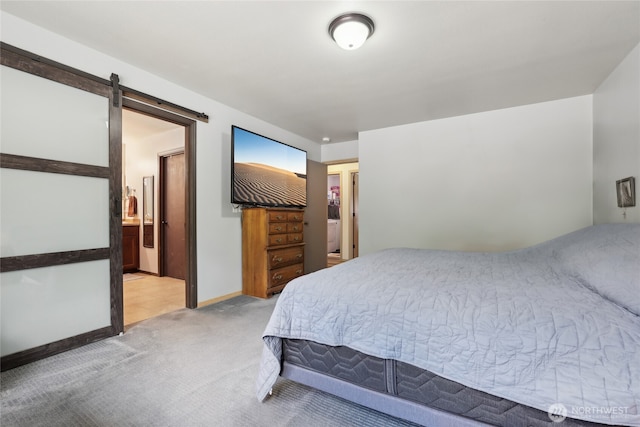 822 Filbert Rd, Cle Elum, WA 98922 - bedroom with light colored carpet and a barn door