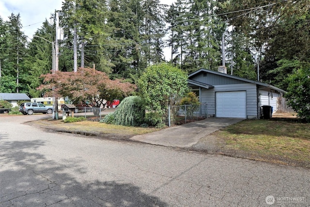 944 Barnhard St, Shelton, WA 98584 - view of front of home with asphalt driveway and a garage