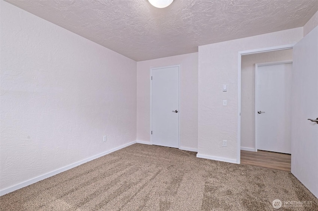 944 Barnhard St, Shelton, WA 98584 - carpeted empty room featuring a textured ceiling and baseboards