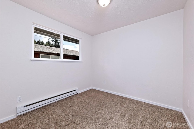 944 Barnhard St, Shelton, WA 98584 - carpeted spare room with a baseboard heating unit and baseboards