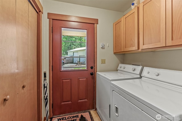 19243 Kiona Rd, Randle, WA 98377 - laundry area featuring cabinet space and separate washer and dryer
