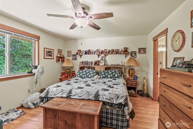 19243 Kiona Rd, Randle, WA 98377 - bedroom featuring light wood finished floors and a ceiling fan