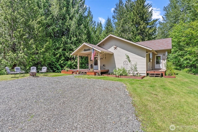 19243 Kiona Rd, Randle, WA 98377 - view of front facade with a front lawn and a deck