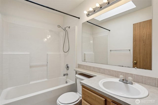 8411 68th Avenue Ct SW, Lakewood, WA 98499 - full bathroom with vanity, toilet, shower / bath combination, and decorative backsplash