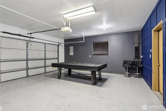 8411 68th Avenue Ct SW, Lakewood, WA 98499 - garage featuring a garage door opener and electric panel