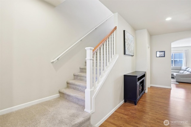 1903 98th Ave SE, Lake Stevens, WA 98258 - stairs with arched walkways, baseboards, wood finished floors, and recessed lighting