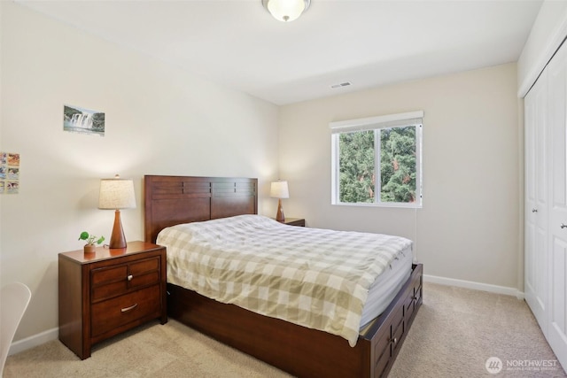 1903 98th Ave SE, Lake Stevens, WA 98258 - bedroom featuring a closet, light colored carpet, and baseboards