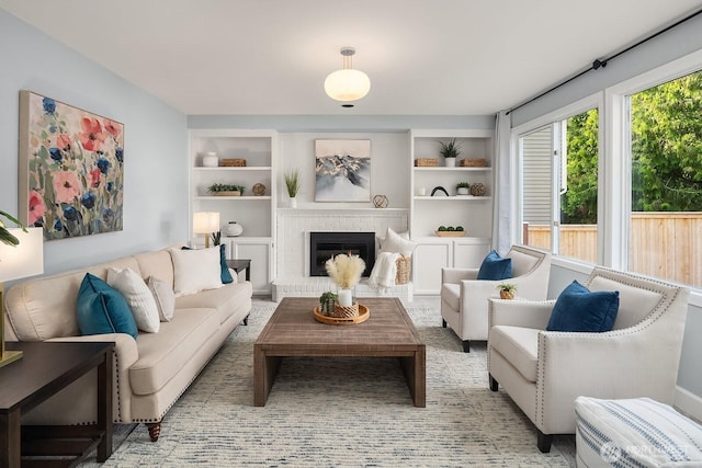 24228 SE 47th St, Sammamish, WA 98029 - living room featuring a fireplace and built in features
