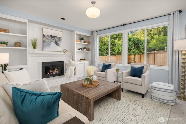 24228 SE 47th St, Sammamish, WA 98029 - living area featuring a fireplace and built in features