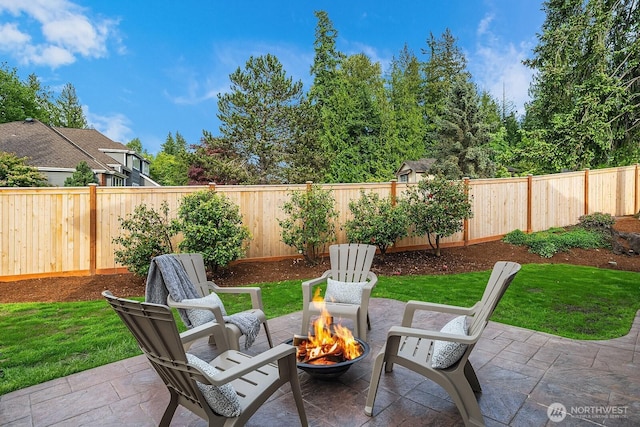 24228 SE 47th St, Sammamish, WA 98029 - view of patio featuring an outdoor fire pit
