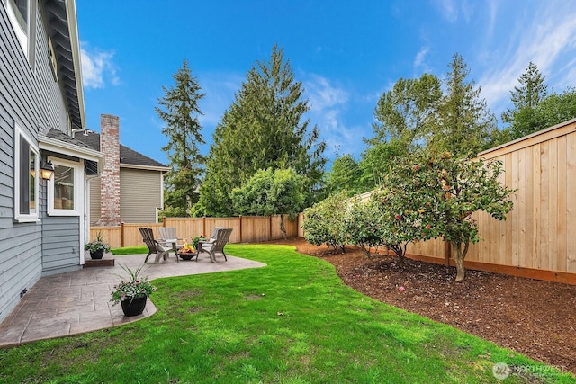 24228 SE 47th St, Sammamish, WA 98029 - view of yard with a patio area and an outdoor fire pit
