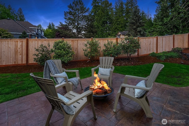 24228 SE 47th St, Sammamish, WA 98029 - fenced backyard with an outdoor fire pit and a patio area