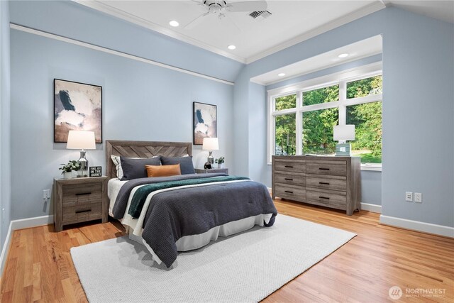 4486 E Harbor Rd, Freeland, WA 98249 - bedroom with baseboards, crown molding, light wood-type flooring, recessed lighting, and a ceiling fan