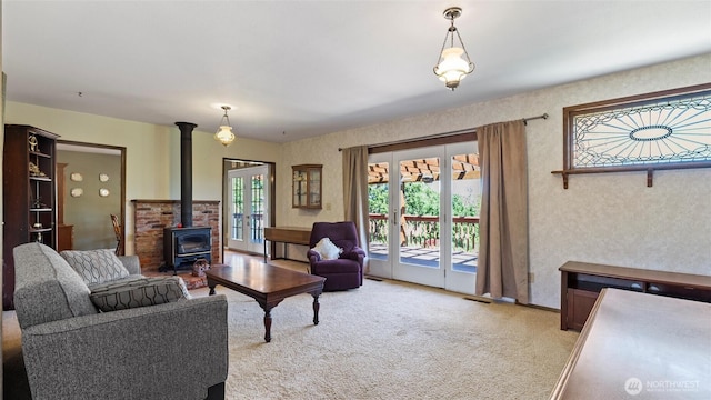 842 W Langdon Rd, Walla Walla, WA 99362 - living area featuring a wood stove and light carpet