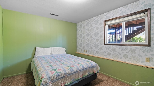 842 W Langdon Rd, Walla Walla, WA 99362 - carpeted bedroom featuring wallpapered walls and baseboards