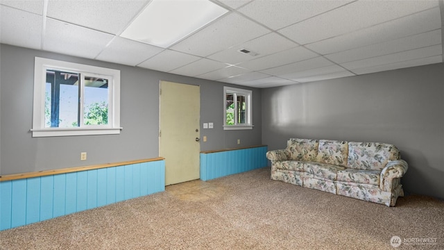 842 W Langdon Rd, Walla Walla, WA 99362 - unfurnished living room with carpet, a paneled ceiling, and a wainscoted wall