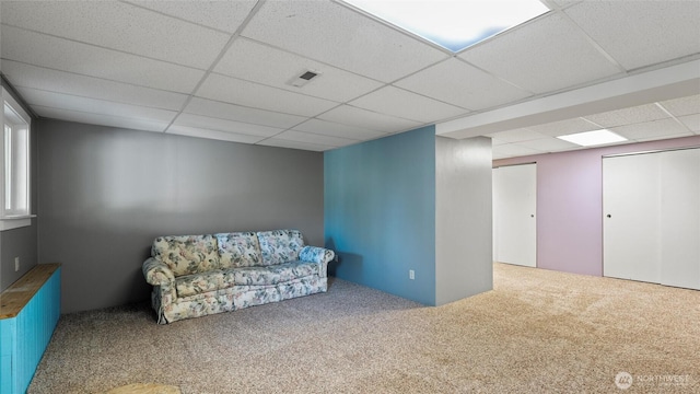 842 W Langdon Rd, Walla Walla, WA 99362 - living area with radiator, carpet flooring, and a paneled ceiling