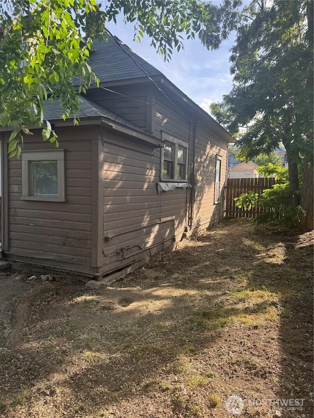 303 Methow St, Wenatchee, WA 98801 - view of home's exterior with a shingled roof