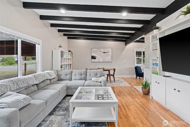 18568 Densmore Ave N, Shoreline, WA 98133 - living area with beam ceiling and light wood finished floors