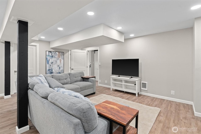 18568 Densmore Ave N, Shoreline, WA 98133 - living room featuring light wood finished floors and recessed lighting