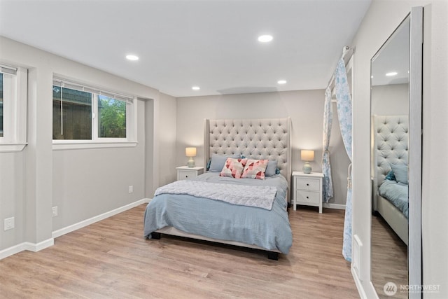 18568 Densmore Ave N, Shoreline, WA 98133 - bedroom with wood finished floors and recessed lighting