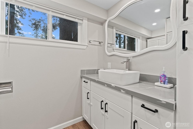 18568 Densmore Ave N, Shoreline, WA 98133 - bathroom with vanity, wood finished floors, and recessed lighting