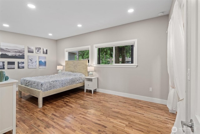 18568 Densmore Ave N, Shoreline, WA 98133 - bedroom featuring light wood-style flooring and recessed lighting