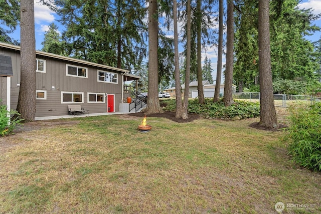 18568 Densmore Ave N, Shoreline, WA 98133 - view of yard with an outdoor fire pit and a patio